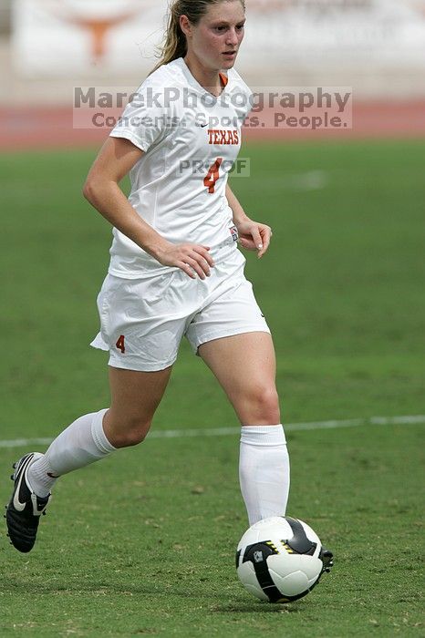 UT senior Jill Gilbeau (#4, Defender and Midfielder) in the second half.  The University of Texas women's soccer team won 2-1 against the Iowa State Cyclones Sunday afternoon, October 5, 2008.

Filename: SRM_20081005_13454411.jpg
Aperture: f/5.6
Shutter Speed: 1/2500
Body: Canon EOS-1D Mark II
Lens: Canon EF 300mm f/2.8 L IS