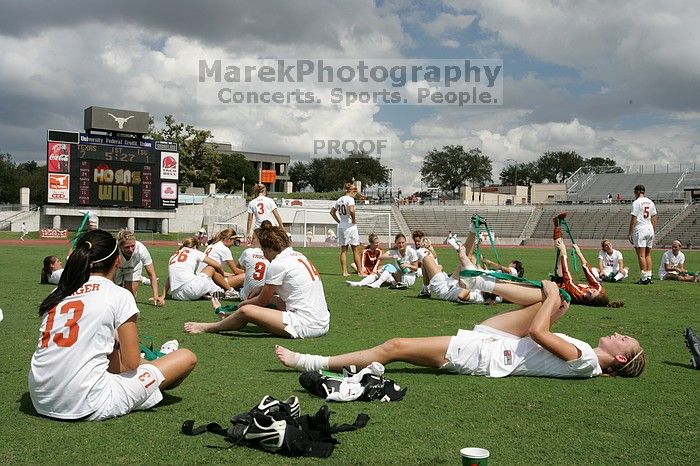 The team stretches after the match.  The University of Texas women's soccer team won 2-1 against the Iowa State Cyclones Sunday afternoon, October 5, 2008.

Filename: SRM_20081005_13532653.jpg
Aperture: f/11.0
Shutter Speed: 1/320
Body: Canon EOS-1D Mark II
Lens: Canon EF 16-35mm f/2.8 L