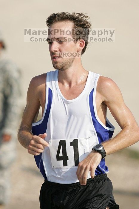 The Army Dillo half-marathon and 32K race.

Filename: SRM_20080921_0941385.jpg
Aperture: f/4.0
Shutter Speed: 1/2000
Body: Canon EOS-1D Mark II
Lens: Canon EF 300mm f/2.8 L IS