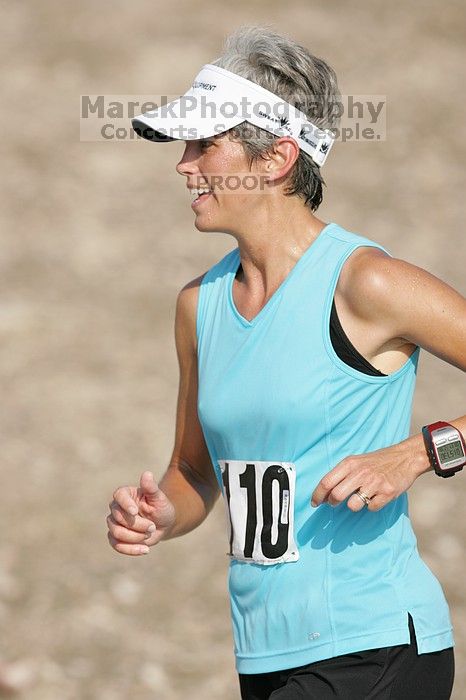 Karen Pearce placed second in her age groun at the Army Dillo half-marathon and 32K race.

Filename: SRM_20080921_0944002.jpg
Aperture: f/4.0
Shutter Speed: 1/2000
Body: Canon EOS-1D Mark II
Lens: Canon EF 300mm f/2.8 L IS