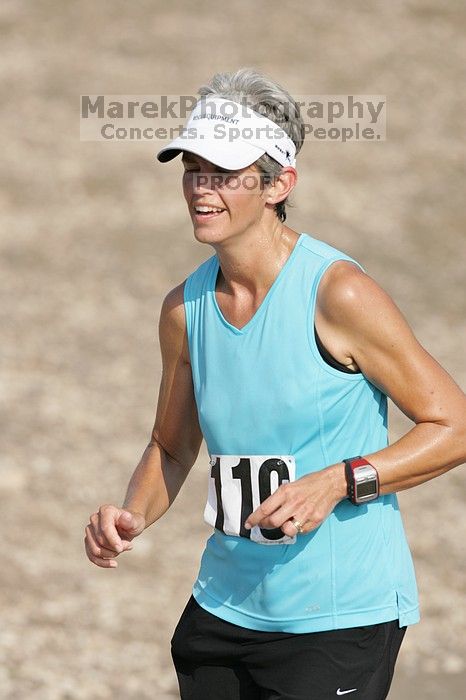 Karen Pearce placed second in her age groun at the Army Dillo half-marathon and 32K race.

Filename: SRM_20080921_0944008.jpg
Aperture: f/4.0
Shutter Speed: 1/2000
Body: Canon EOS-1D Mark II
Lens: Canon EF 300mm f/2.8 L IS