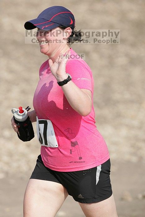 Meredith Cohen running the Army Dillo half-marathon and 32K race.

Filename: SRM_20080921_1001088.jpg
Aperture: f/4.0
Shutter Speed: 1/2000
Body: Canon EOS-1D Mark II
Lens: Canon EF 300mm f/2.8 L IS