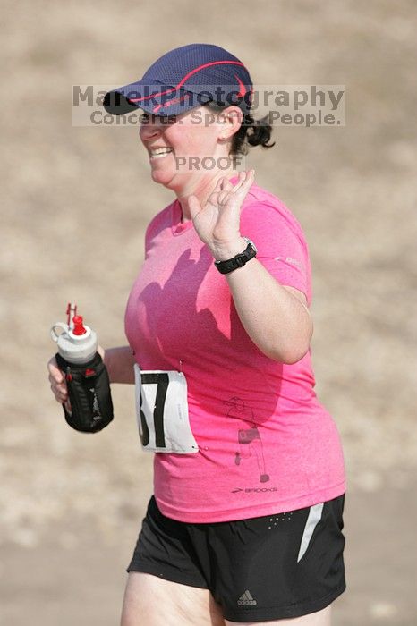 Meredith Cohen running the Army Dillo half-marathon and 32K race.

Filename: SRM_20080921_1001089.jpg
Aperture: f/4.0
Shutter Speed: 1/2000
Body: Canon EOS-1D Mark II
Lens: Canon EF 300mm f/2.8 L IS