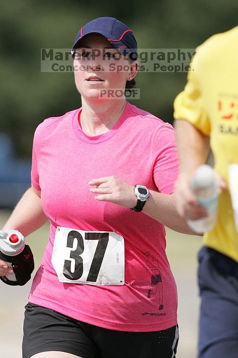 Meredith Cohen running the Army Dillo half-marathon and 32K race.

Filename: SRM_20080921_1116024.jpg
Aperture: f/4.0
Shutter Speed: 1/2000
Body: Canon EOS-1D Mark II
Lens: Canon EF 300mm f/2.8 L IS