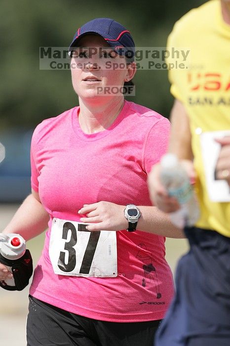 Meredith Cohen running the Army Dillo half-marathon and 32K race.

Filename: SRM_20080921_1116025.jpg
Aperture: f/4.0
Shutter Speed: 1/2000
Body: Canon EOS-1D Mark II
Lens: Canon EF 300mm f/2.8 L IS