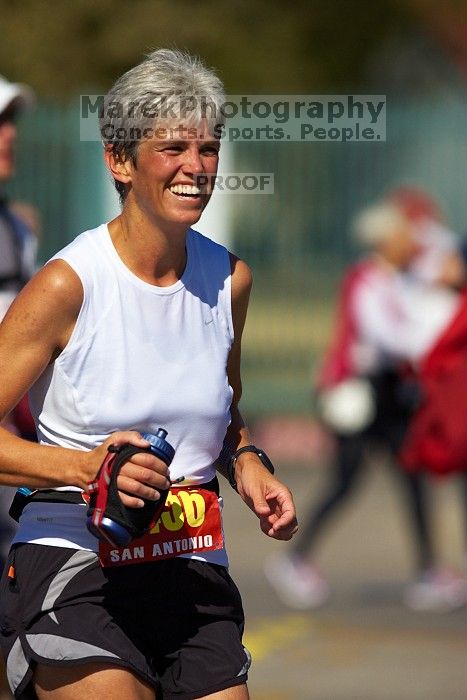 Karen Pearce.  The first annual San Antonio Rock and Roll Marathon, Sunday, November 16, 2008.

Filename: SRM_20081116_12014068.jpg
Aperture: f/4.0
Shutter Speed: 1/4000
Body: Canon EOS-1D Mark II
Lens: Canon EF 300mm f/2.8 L IS