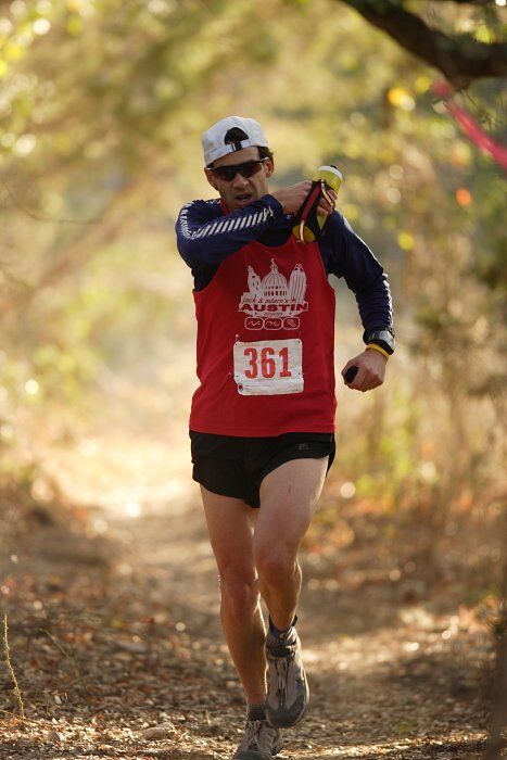 Paul Terranova placed first in his age group, fourth overall in the 25K at the Bandera 25K, 50K, and 100K trail race in Bandera, TX on Saturday, January 10, 2009.

Filename: SRM_20090110_09022846.jpg
Aperture: f/2.8
Shutter Speed: 1/400
Body: Canon EOS-1D Mark II
Lens: Canon EF 300mm f/2.8 L IS