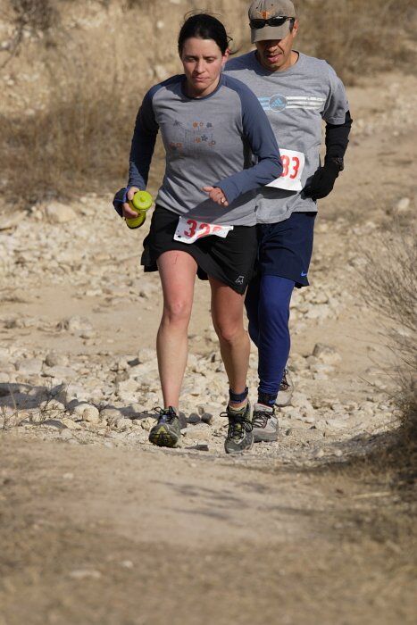 Beth Marek placed 5th in her age group in the 25K at the. Bandera 25K, 50K, and 100K trail race in Bandera, TX on Saturday, January 10, 2009.

Filename: SRM_20090110_10180603.jpg
Aperture: f/5.6
Shutter Speed: 1/800
Body: Canon EOS-1D Mark II
Lens: Canon EF 300mm f/2.8 L IS