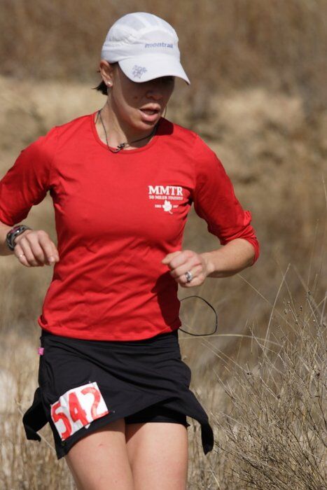 Meredith Terranova placed second overall in the 50K at the Bandera 25K, 50K, and 100K trail race in Bandera, TX on Saturday, January 10, 2009.

Filename: SRM_20090110_12423834.jpg
Aperture: f/5.6
Shutter Speed: 1/1000
Body: Canon EOS-1D Mark II
Lens: Canon EF 300mm f/2.8 L IS