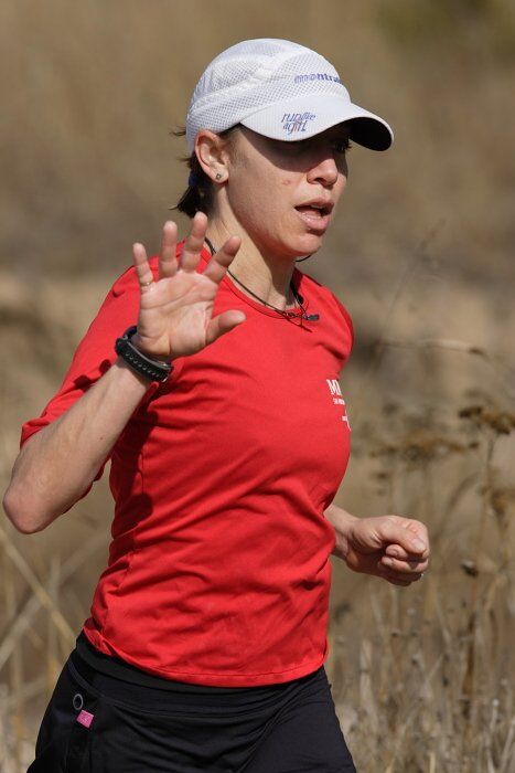 Meredith Terranova placed second overall in the 50K at the Bandera 25K, 50K, and 100K trail race in Bandera, TX on Saturday, January 10, 2009.

Filename: SRM_20090110_12424437.jpg
Aperture: f/5.6
Shutter Speed: 1/800
Body: Canon EOS-1D Mark II
Lens: Canon EF 300mm f/2.8 L IS