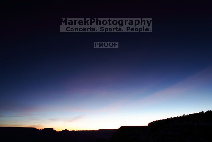 First sunrise of the new year at the south rim of the Grand Canyon, Thursday January 1, 2009.  The temperature was as low as 15 F the night before with a foot and a half of snow on the ground.  Luckily sunrise wasn't until 7:40.

Filename: SRM_20090101_06571785.JPG
Aperture: f/8.0
Shutter Speed: 30/1
Body: Canon EOS-1D Mark II
Lens: Canon EF 16-35mm f/2.8 L