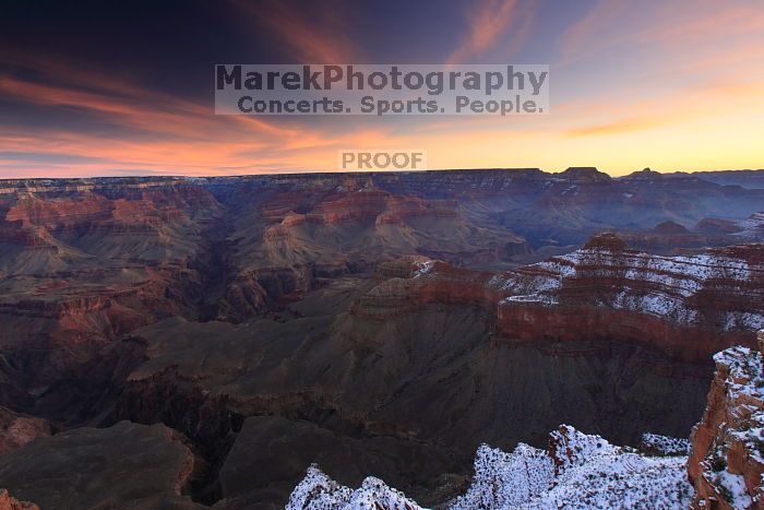 First sunrise of the new year at the south rim of the Grand Canyon, Thursday January 1, 2009.  The temperature was as low as 15 F the night before with a foot and a half of snow on the ground.  Luckily sunrise wasn't until 7:40.

Filename: SRM_20090101_07321202.JPG
Aperture: f/16.0
Shutter Speed: 32/10
Body: Canon EOS-1D Mark II
Lens: Canon EF 16-35mm f/2.8 L