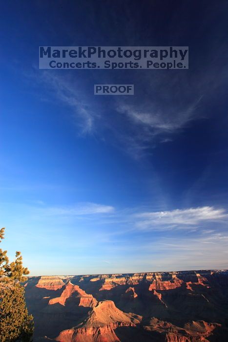 First sunrise of the new year at the south rim of the Grand Canyon, Thursday January 1, 2009.  The temperature was as low as 15 F the night before with a foot and a half of snow on the ground.  Luckily sunrise wasn't until 7:40.

Filename: SRM_20090101_08034934.JPG
Aperture: f/14.0
Shutter Speed: 1/15
Body: Canon EOS-1D Mark II
Lens: Canon EF 16-35mm f/2.8 L