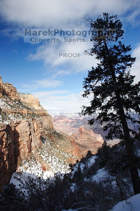 Hike up the Bright Angel trail from Indian Gardens campground, while backpacking the Grand Canyon, on Sunday, January 4, 2009.

Filename: SRM_20090104_12370156.JPG
Aperture: f/16.0
Shutter Speed: 1/40
Body: Canon EOS-1D Mark II
Lens: Canon EF 16-35mm f/2.8 L