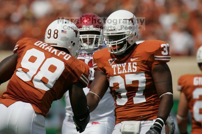 The University of Texas football team defeated the Arkansas Razorbacks with a score of 52-10 in Austin, TX on Saturday, September 27, 2008.

Filename: SRM_20080927_14371461.jpg
Aperture: f/5.6
Shutter Speed: 1/3200
Body: Canon EOS-1D Mark II
Lens: Canon EF 300mm f/2.8 L IS