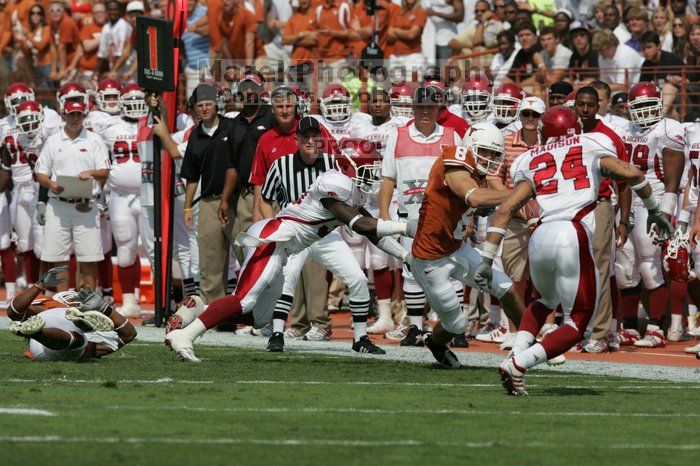 The University of Texas football team defeated the Arkansas Razorbacks with a score of 52-10 in Austin, TX on Saturday, September 27, 2008.

Filename: SRM_20080927_14400282.jpg
Aperture: f/5.6
Shutter Speed: 1/4000
Body: Canon EOS-1D Mark II
Lens: Canon EF 300mm f/2.8 L IS