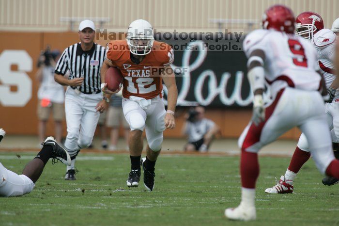 The University of Texas football team defeated the Arkansas Razorbacks with a score of 52-10 in Austin, TX on Saturday, September 27, 2008.

Filename: SRM_20080927_14552827.jpg
Aperture: f/5.6
Shutter Speed: 1/1000
Body: Canon EOS-1D Mark II
Lens: Canon EF 300mm f/2.8 L IS