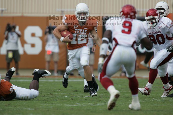 The University of Texas football team defeated the Arkansas Razorbacks with a score of 52-10 in Austin, TX on Saturday, September 27, 2008.

Filename: SRM_20080927_14552829.jpg
Aperture: f/5.6
Shutter Speed: 1/1000
Body: Canon EOS-1D Mark II
Lens: Canon EF 300mm f/2.8 L IS