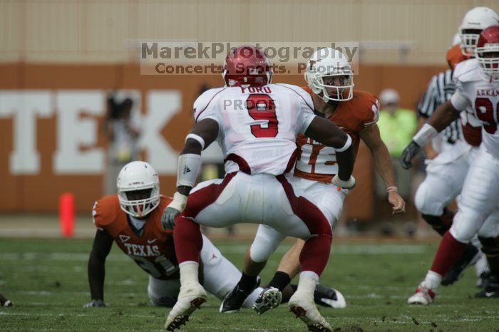 The University of Texas football team defeated the Arkansas Razorbacks with a score of 52-10 in Austin, TX on Saturday, September 27, 2008.

Filename: SRM_20080927_14553032.jpg
Aperture: f/5.6
Shutter Speed: 1/1600
Body: Canon EOS-1D Mark II
Lens: Canon EF 300mm f/2.8 L IS