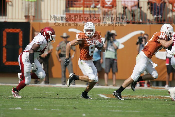 The University of Texas football team defeated the Arkansas Razorbacks with a score of 52-10 in Austin, TX on Saturday, September 27, 2008.

Filename: SRM_20080927_15090886.jpg
Aperture: f/5.6
Shutter Speed: 1/2000
Body: Canon EOS-1D Mark II
Lens: Canon EF 300mm f/2.8 L IS