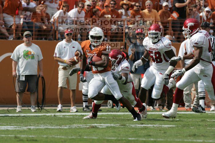 The University of Texas football team defeated the Arkansas Razorbacks with a score of 52-10 in Austin, TX on Saturday, September 27, 2008.

Filename: SRM_20080927_15121619.jpg
Aperture: f/5.6
Shutter Speed: 1/1600
Body: Canon EOS-1D Mark II
Lens: Canon EF 300mm f/2.8 L IS