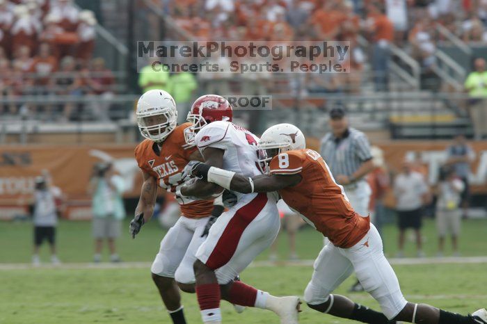 The University of Texas football team defeated the Arkansas Razorbacks with a score of 52-10 in Austin, TX on Saturday, September 27, 2008.

Filename: SRM_20080927_15243886.jpg
Aperture: f/6.3
Shutter Speed: 1/400
Body: Canon EOS-1D Mark II
Lens: Canon EF 300mm f/2.8 L IS