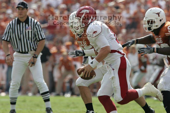 The University of Texas football team defeated the Arkansas Razorbacks with a score of 52-10 in Austin, TX on Saturday, September 27, 2008.

Filename: SRM_20080927_15440411.jpg
Aperture: f/5.6
Shutter Speed: 1/1250
Body: Canon EOS-1D Mark II
Lens: Canon EF 300mm f/2.8 L IS