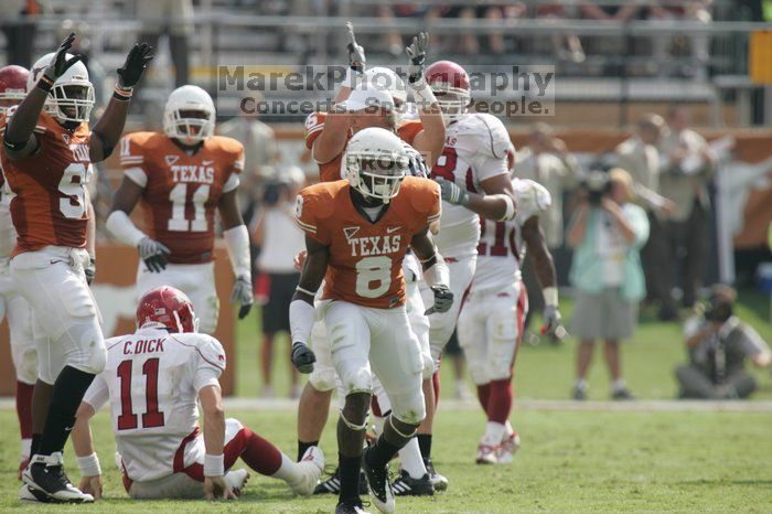 The University of Texas football team defeated the Arkansas Razorbacks with a score of 52-10 in Austin, TX on Saturday, September 27, 2008.

Filename: SRM_20080927_15462257.jpg
Aperture: f/5.6
Shutter Speed: 1/1000
Body: Canon EOS-1D Mark II
Lens: Canon EF 300mm f/2.8 L IS