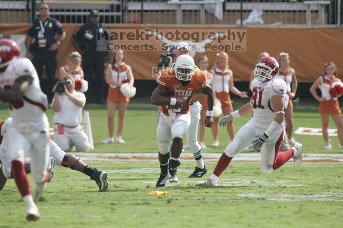 The University of Texas football team defeated the Arkansas Razorbacks with a score of 52-10 in Austin, TX on Saturday, September 27, 2008.

Filename: SRM_20080927_15505089.jpg
Aperture: f/5.6
Shutter Speed: 1/1000
Body: Canon EOS-1D Mark II
Lens: Canon EF 300mm f/2.8 L IS