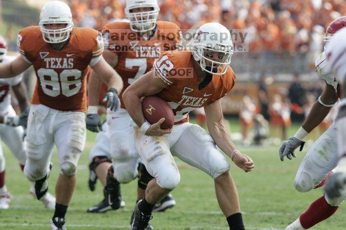 The University of Texas football team defeated the Arkansas Razorbacks with a score of 52-10 in Austin, TX on Saturday, September 27, 2008.

Filename: SRM_20080927_15584289.jpg
Aperture: f/5.6
Shutter Speed: 1/500
Body: Canon EOS-1D Mark II
Lens: Canon EF 300mm f/2.8 L IS