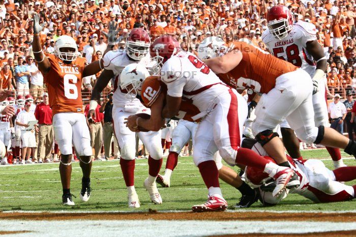 The University of Texas football team defeated the Arkansas Razorbacks with a score of 52-10 in Austin, TX on Saturday, September 27, 2008.

Filename: SRM_20080927_15592676.jpg
Aperture: f/5.6
Shutter Speed: 1/1000
Body: Canon EOS 20D
Lens: Canon EF 80-200mm f/2.8 L