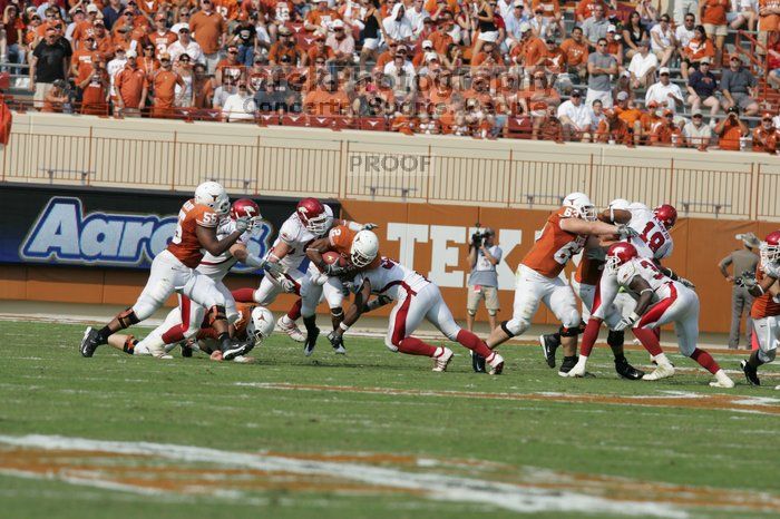 The University of Texas football team defeated the Arkansas Razorbacks with a score of 52-10 in Austin, TX on Saturday, September 27, 2008.

Filename: SRM_20080927_16262626.jpg
Aperture: f/5.0
Shutter Speed: 1/3200
Body: Canon EOS-1D Mark II
Lens: Canon EF 300mm f/2.8 L IS