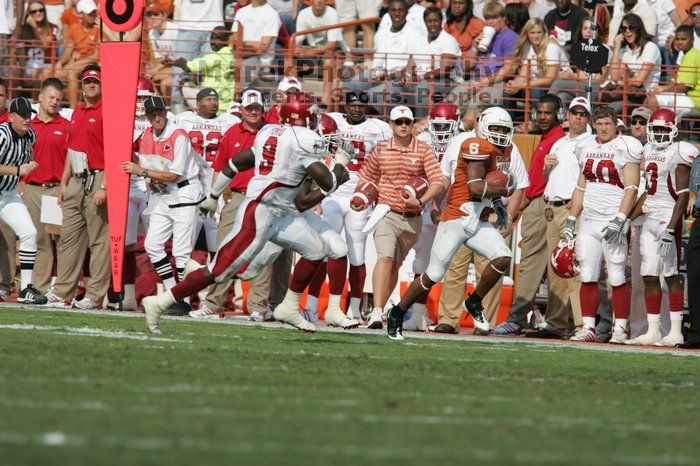 The University of Texas football team defeated the Arkansas Razorbacks with a score of 52-10 in Austin, TX on Saturday, September 27, 2008.

Filename: SRM_20080927_16272432.jpg
Aperture: f/5.0
Shutter Speed: 1/3200
Body: Canon EOS-1D Mark II
Lens: Canon EF 300mm f/2.8 L IS