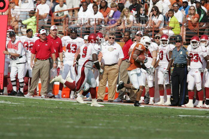 The University of Texas football team defeated the Arkansas Razorbacks with a score of 52-10 in Austin, TX on Saturday, September 27, 2008.

Filename: SRM_20080927_16272433.jpg
Aperture: f/5.0
Shutter Speed: 1/2500
Body: Canon EOS-1D Mark II
Lens: Canon EF 300mm f/2.8 L IS