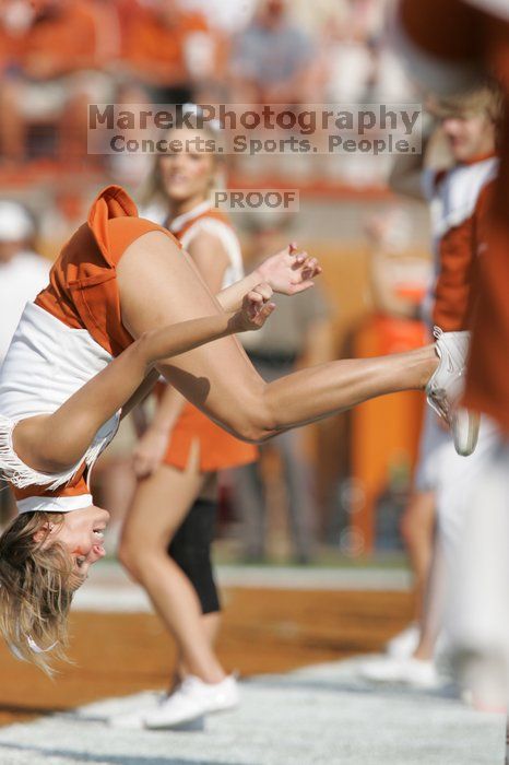 Texas Cheerleaders.  The University of Texas football team defeated the Arkansas Razorbacks with a score of 52-10 in Austin, TX on Saturday, September 27, 2008.

Filename: SRM_20080927_16314897.jpg
Aperture: f/5.0
Shutter Speed: 1/2500
Body: Canon EOS-1D Mark II
Lens: Canon EF 300mm f/2.8 L IS