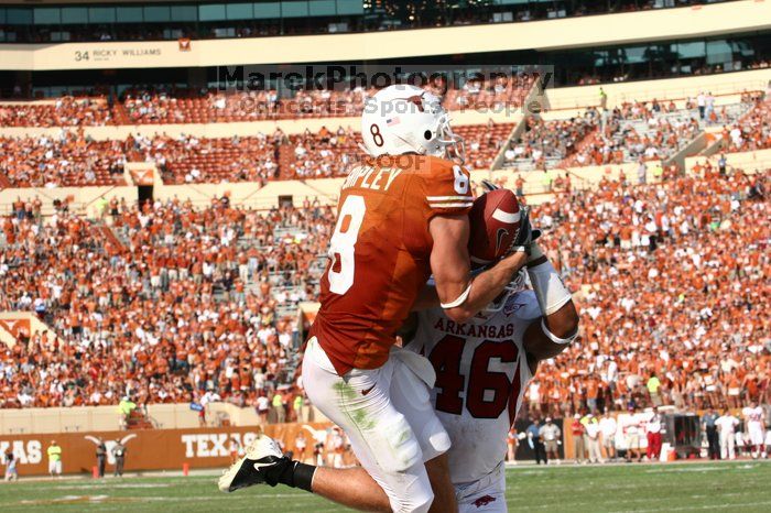 The University of Texas football team defeated the Arkansas Razorbacks with a score of 52-10 in Austin, TX on Saturday, September 27, 2008.

Filename: SRM_20080927_16470096.jpg
Aperture: f/5.6
Shutter Speed: 1/2000
Body: Canon EOS 20D
Lens: Canon EF 80-200mm f/2.8 L