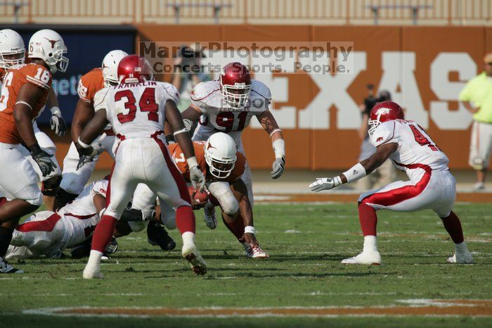 The University of Texas football team defeated the Arkansas Razorbacks with a score of 52-10 in Austin, TX on Saturday, September 27, 2008.

Filename: SRM_20080927_16575077.jpg
Aperture: f/5.6
Shutter Speed: 1/2500
Body: Canon EOS-1D Mark II
Lens: Canon EF 300mm f/2.8 L IS