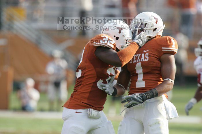 The University of Texas football team defeated the Arkansas Razorbacks with a score of 52-10 in Austin, TX on Saturday, September 27, 2008.

Filename: SRM_20080927_17035011.jpg
Aperture: f/5.6
Shutter Speed: 1/800
Body: Canon EOS-1D Mark II
Lens: Canon EF 300mm f/2.8 L IS