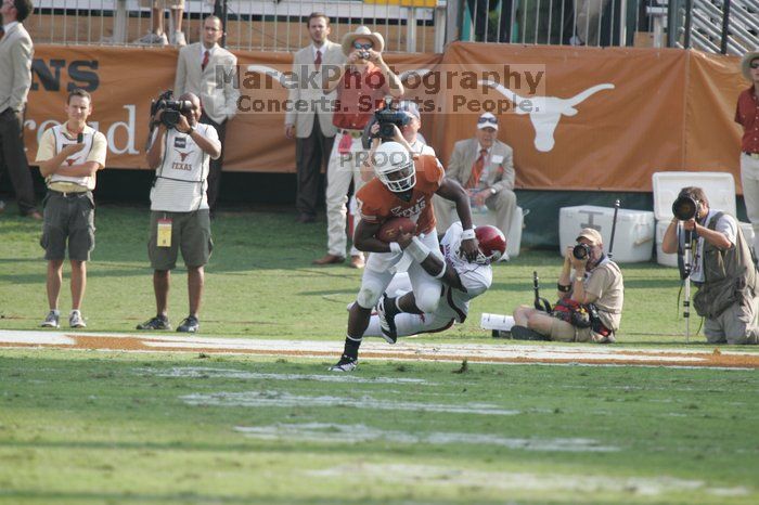 The University of Texas football team defeated the Arkansas Razorbacks with a score of 52-10 in Austin, TX on Saturday, September 27, 2008.

Filename: SRM_20080927_17073042.jpg
Aperture: f/5.6
Shutter Speed: 1/1000
Body: Canon EOS-1D Mark II
Lens: Canon EF 300mm f/2.8 L IS