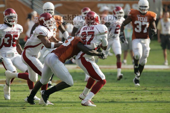 The University of Texas football team defeated the Arkansas Razorbacks with a score of 52-10 in Austin, TX on Saturday, September 27, 2008.

Filename: SRM_20080927_17081051.jpg
Aperture: f/5.6
Shutter Speed: 1/1600
Body: Canon EOS-1D Mark II
Lens: Canon EF 300mm f/2.8 L IS