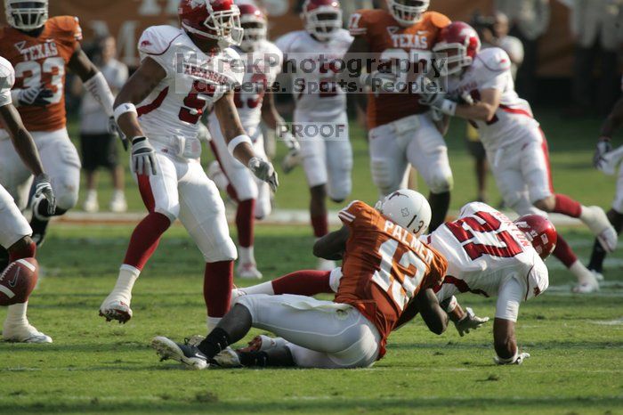 The University of Texas football team defeated the Arkansas Razorbacks with a score of 52-10 in Austin, TX on Saturday, September 27, 2008.

Filename: SRM_20080927_17081254.jpg
Aperture: f/5.6
Shutter Speed: 1/2000
Body: Canon EOS-1D Mark II
Lens: Canon EF 300mm f/2.8 L IS