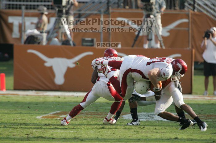 The University of Texas football team defeated the Arkansas Razorbacks with a score of 52-10 in Austin, TX on Saturday, September 27, 2008.

Filename: SRM_20080927_17125200.jpg
Aperture: f/5.6
Shutter Speed: 1/1250
Body: Canon EOS-1D Mark II
Lens: Canon EF 300mm f/2.8 L IS