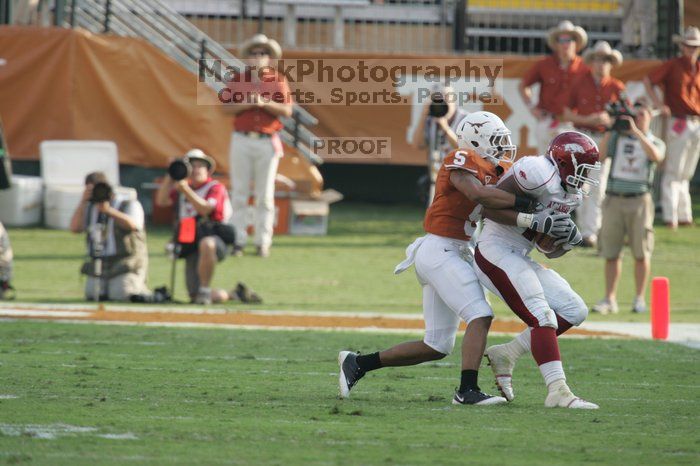 The University of Texas football team defeated the Arkansas Razorbacks with a score of 52-10 in Austin, TX on Saturday, September 27, 2008.

Filename: SRM_20080927_17133016.jpg
Aperture: f/5.6
Shutter Speed: 1/800
Body: Canon EOS-1D Mark II
Lens: Canon EF 300mm f/2.8 L IS