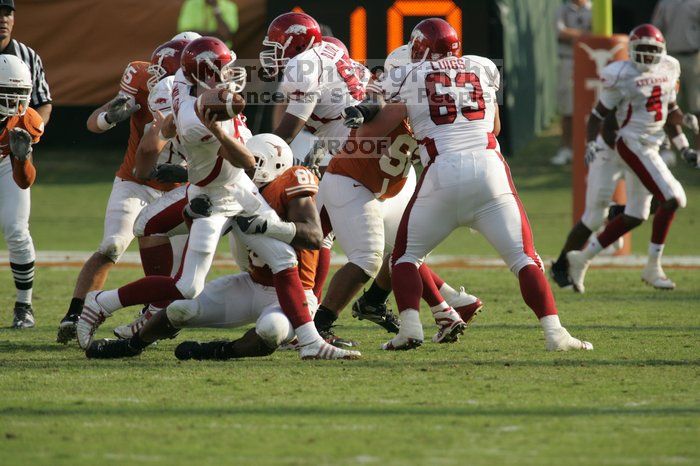 The University of Texas football team defeated the Arkansas Razorbacks with a score of 52-10 in Austin, TX on Saturday, September 27, 2008.

Filename: SRM_20080927_17153446.jpg
Aperture: f/5.6
Shutter Speed: 1/1600
Body: Canon EOS-1D Mark II
Lens: Canon EF 300mm f/2.8 L IS