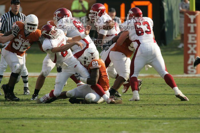 The University of Texas football team defeated the Arkansas Razorbacks with a score of 52-10 in Austin, TX on Saturday, September 27, 2008.

Filename: SRM_20080927_17153447.jpg
Aperture: f/5.6
Shutter Speed: 1/1600
Body: Canon EOS-1D Mark II
Lens: Canon EF 300mm f/2.8 L IS