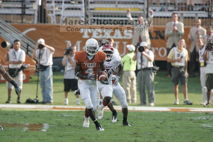 The University of Texas football team defeated the Arkansas Razorbacks with a score of 52-10 in Austin, TX on Saturday, September 27, 2008.
Filename: SRM_20080927_17161875.jpg
Aperture: f/5.6
Shutter Speed: 1/800
Body: Canon EOS-1D Mark II
Lens: Canon EF 300mm f/2.8 L IS