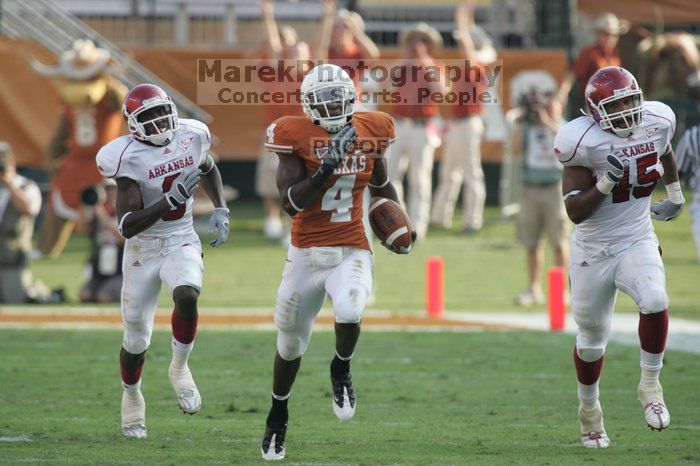 The University of Texas football team defeated the Arkansas Razorbacks with a score of 52-10 in Austin, TX on Saturday, September 27, 2008.

Filename: SRM_20080927_17162082.jpg
Aperture: f/5.6
Shutter Speed: 1/800
Body: Canon EOS-1D Mark II
Lens: Canon EF 300mm f/2.8 L IS