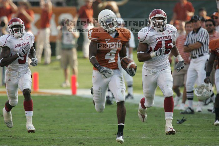 The University of Texas football team defeated the Arkansas Razorbacks with a score of 52-10 in Austin, TX on Saturday, September 27, 2008.

Filename: SRM_20080927_17162084.jpg
Aperture: f/5.6
Shutter Speed: 1/800
Body: Canon EOS-1D Mark II
Lens: Canon EF 300mm f/2.8 L IS