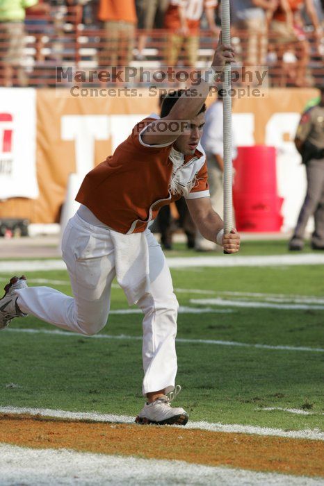 Texas Cheerleaders.  The University of Texas football team defeated the Arkansas Razorbacks with a score of 52-10 in Austin, TX on Saturday, September 27, 2008.

Filename: SRM_20080927_17181800.jpg
Aperture: f/5.6
Shutter Speed: 1/1600
Body: Canon EOS-1D Mark II
Lens: Canon EF 300mm f/2.8 L IS