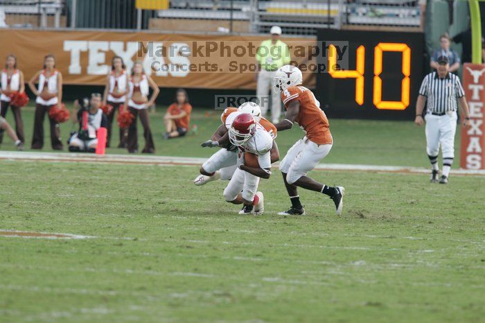 The University of Texas football team defeated the Arkansas Razorbacks with a score of 52-10 in Austin, TX on Saturday, September 27, 2008.

Filename: SRM_20080927_17253874.jpg
Aperture: f/5.0
Shutter Speed: 1/640
Body: Canon EOS-1D Mark II
Lens: Canon EF 300mm f/2.8 L IS